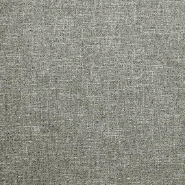 Close-up of muted stone-grey fabric with fine crosswoven texture and subtle tonal variation