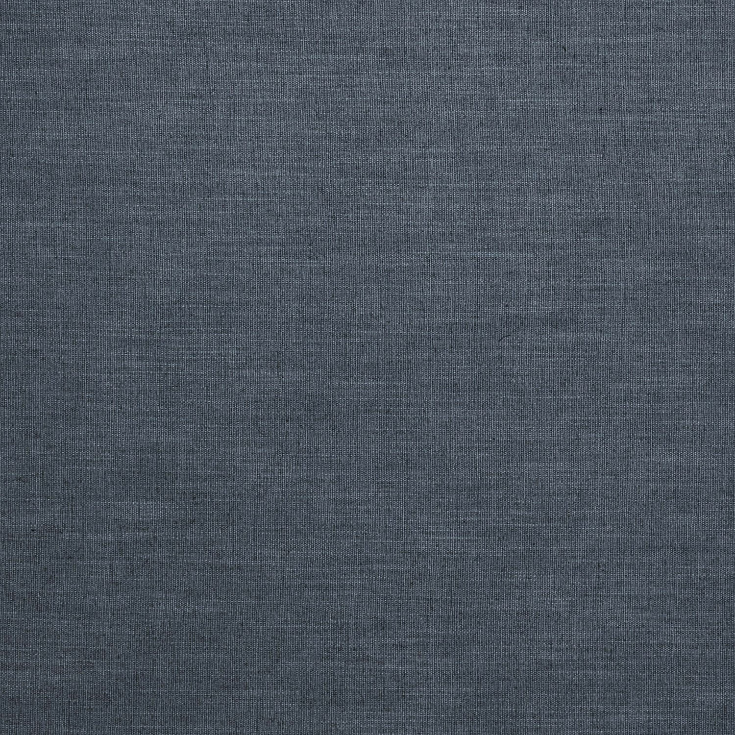 Close-up of dark indigo blue plain linen-rich fabric with subtle woven texture