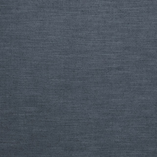 Close-up of dark indigo blue plain linen-rich fabric with subtle woven texture
