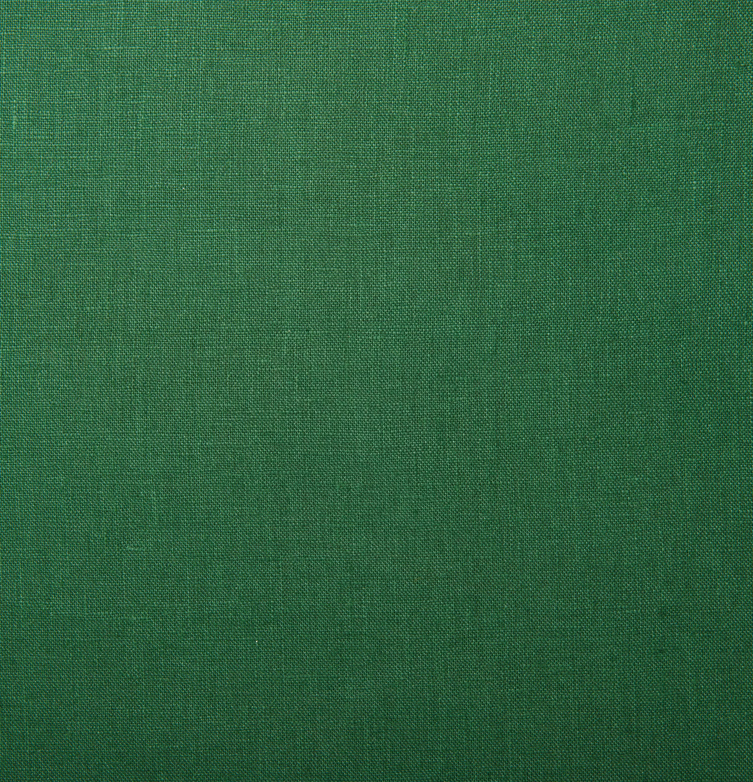 Close-up of muted aqua-green plain linen with a fine, lightly slubbed weave