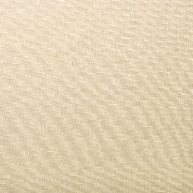 Warm butter-cream linen showing a fine, subtly irregular plain weave