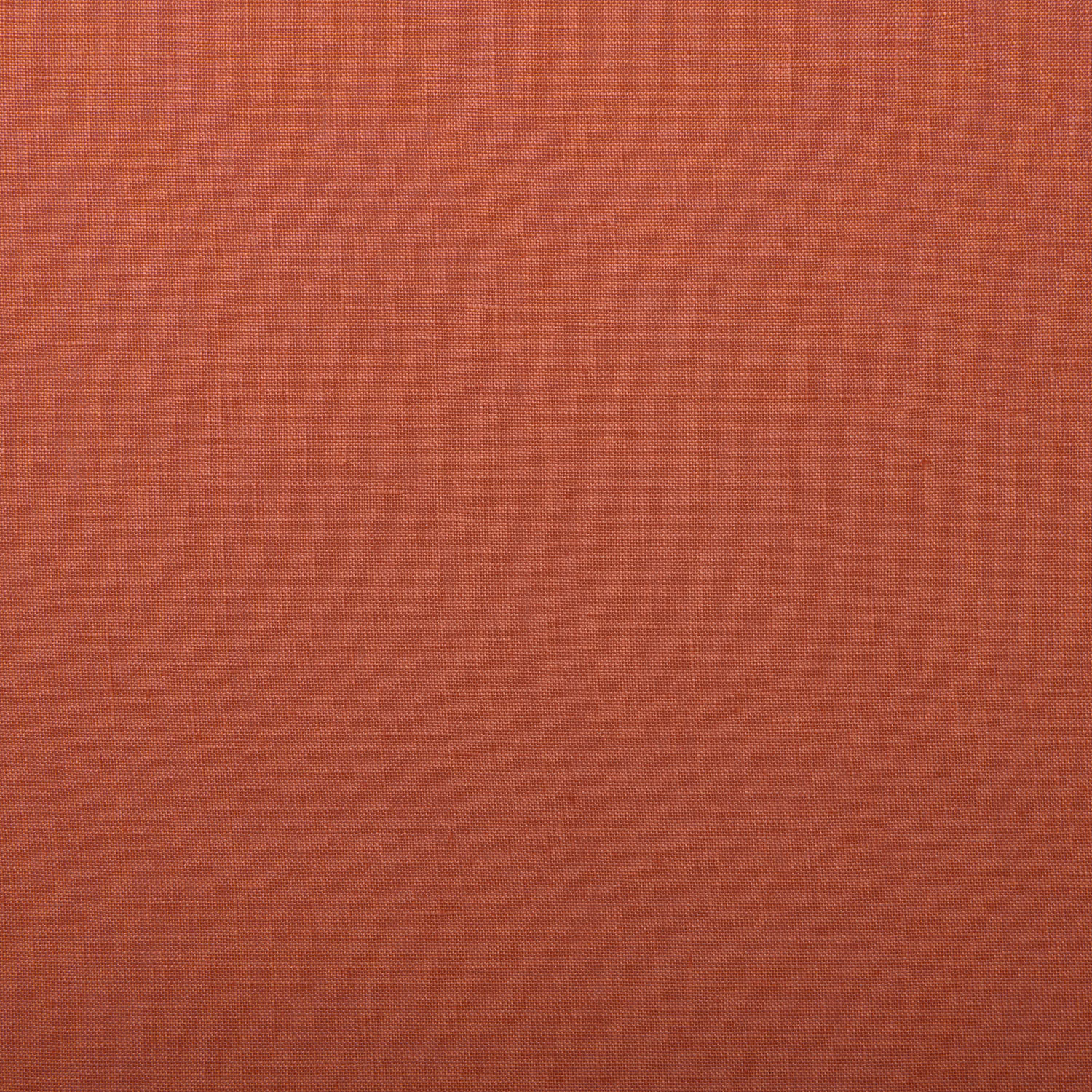 Warm coral linen with a fine plain weave and subtly crosshatched surface