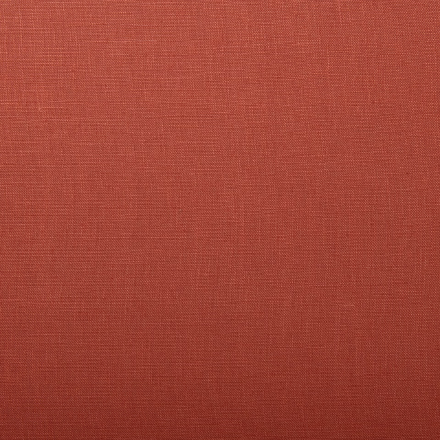 Close-up of muted country red linen showing a fine, even plain weave