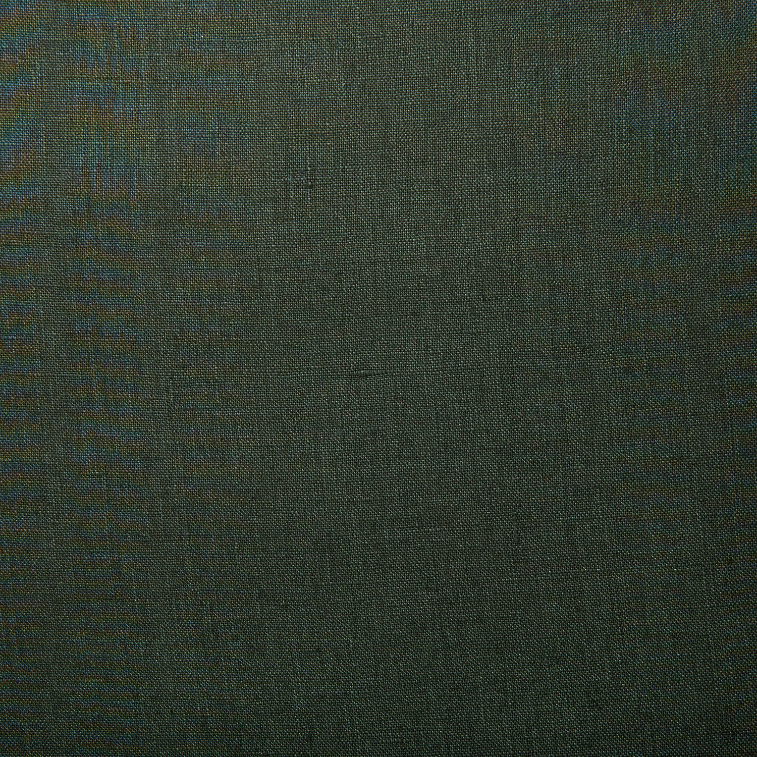 Close-up of deep forest green linen with a fine, irregular crosshatch weave