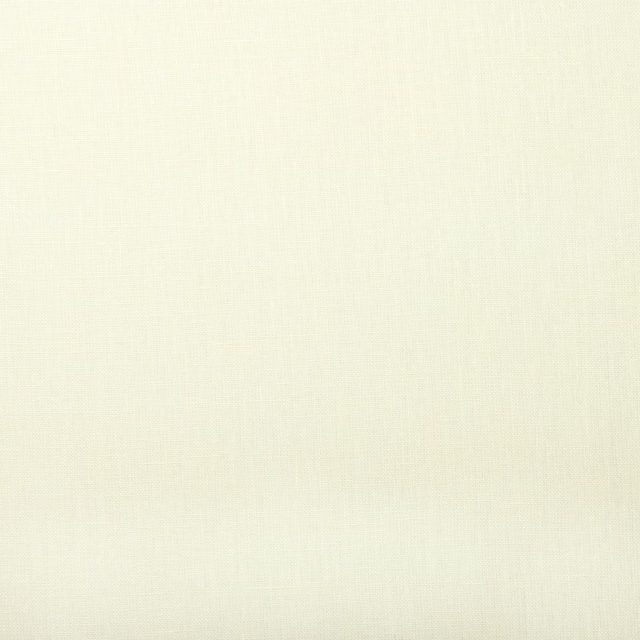 Close-up of pale ghost ivory linen with a fine, lightly textured plain weave.