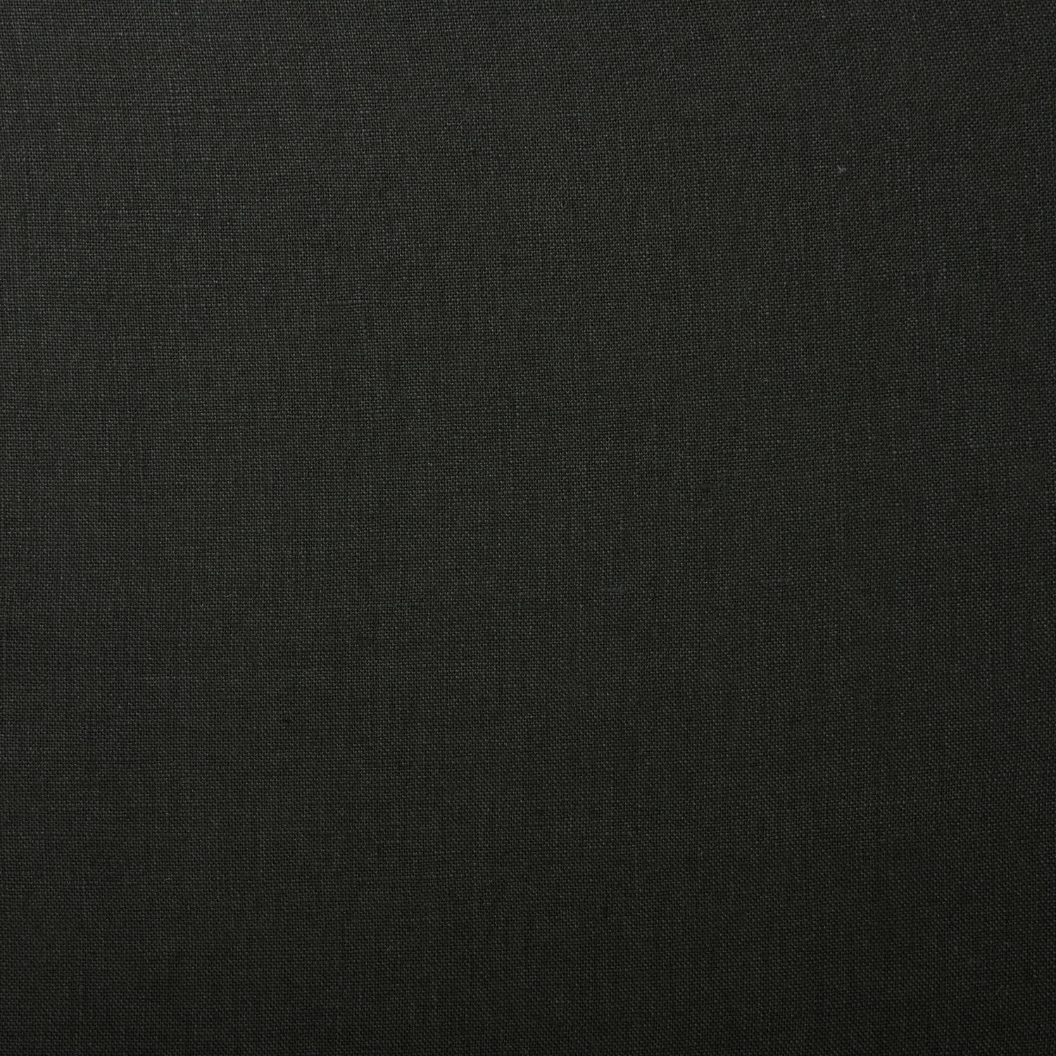 Close-up of deep charcoal-black plain linen showing a fine, subtly irregular weave