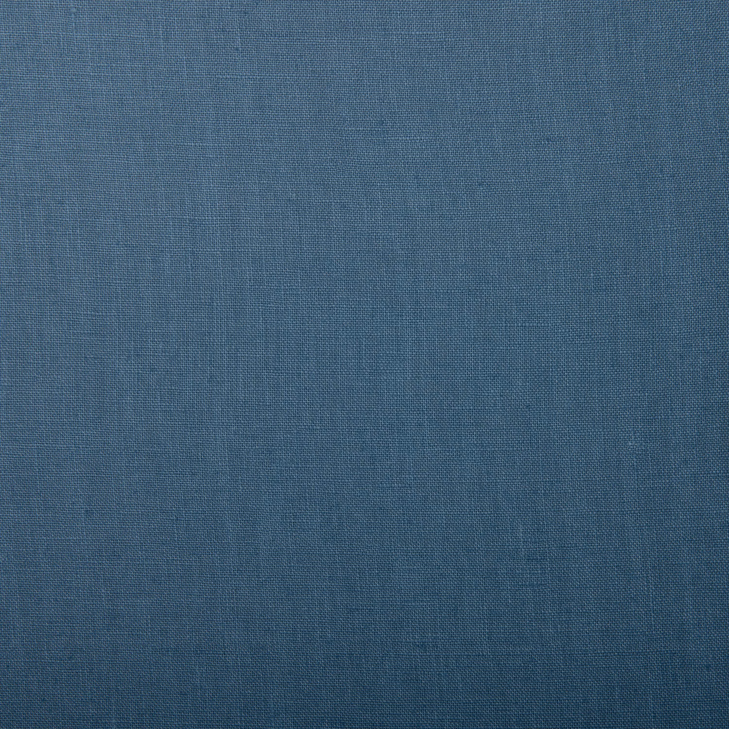 Close-up of plain-woven True Blue linen in a muted denim-blue shade