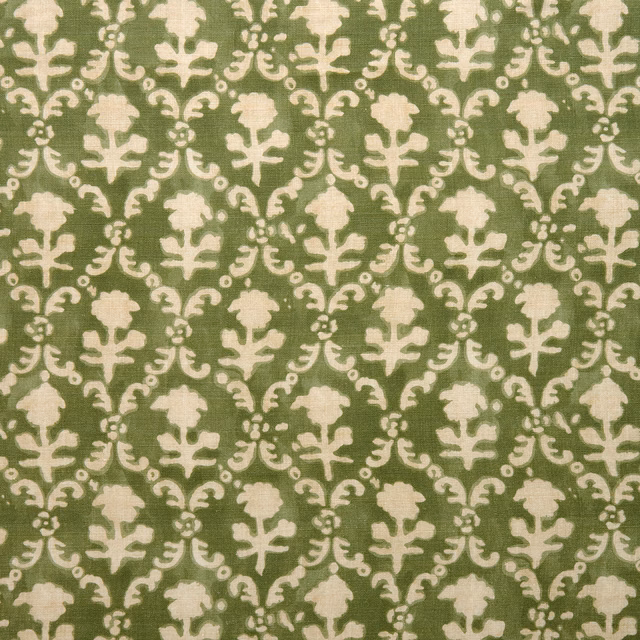 Olive green linen fabric with repeating ivory floral lattice motif