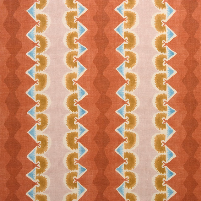 Brick red striped fabric with pale blue and mustard zigzag motifs on a blush ground