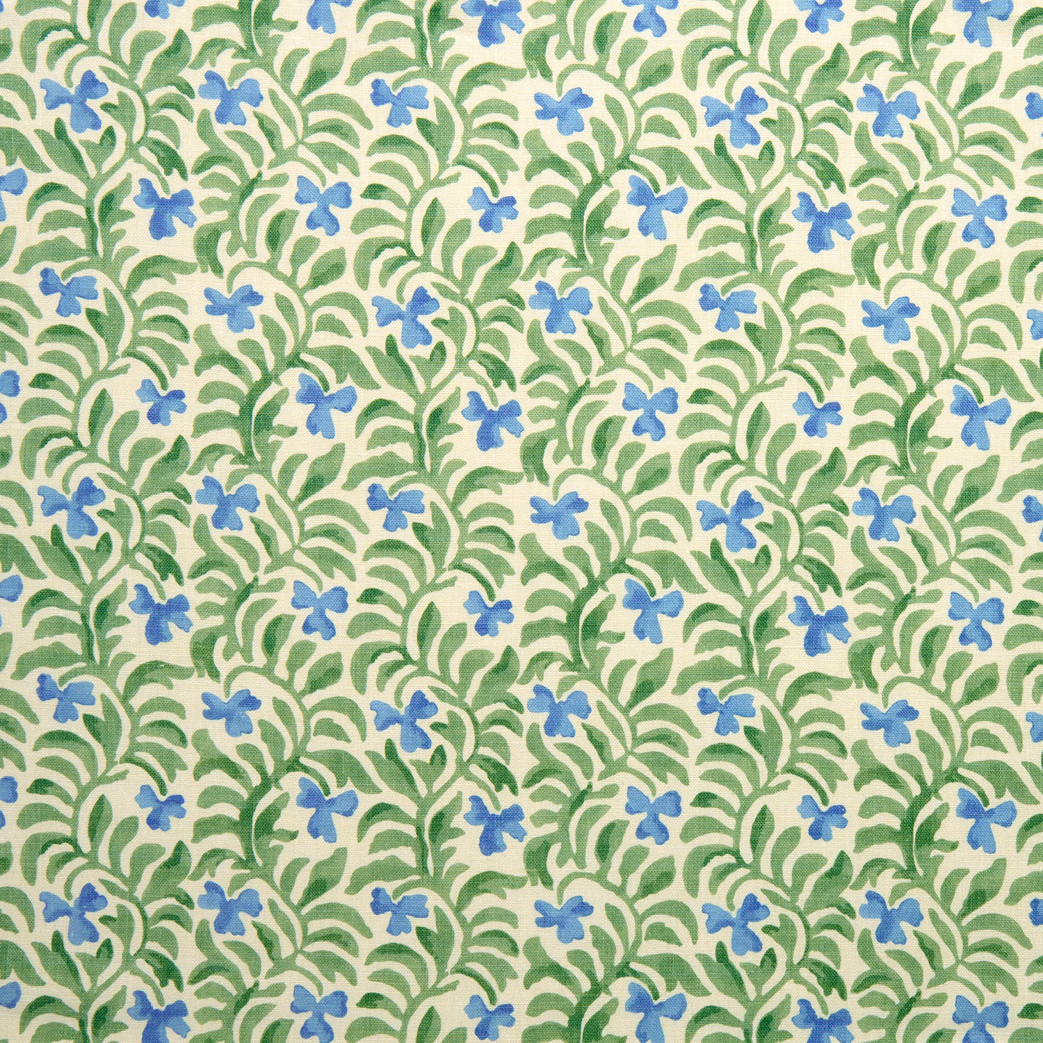 Blue flowers and green leafy vines on a pale ground, small-scale botanical cushion fabric