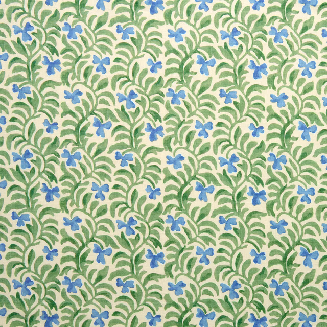 Blue flowers and green leafy vines on a pale ground, small-scale botanical cushion fabric