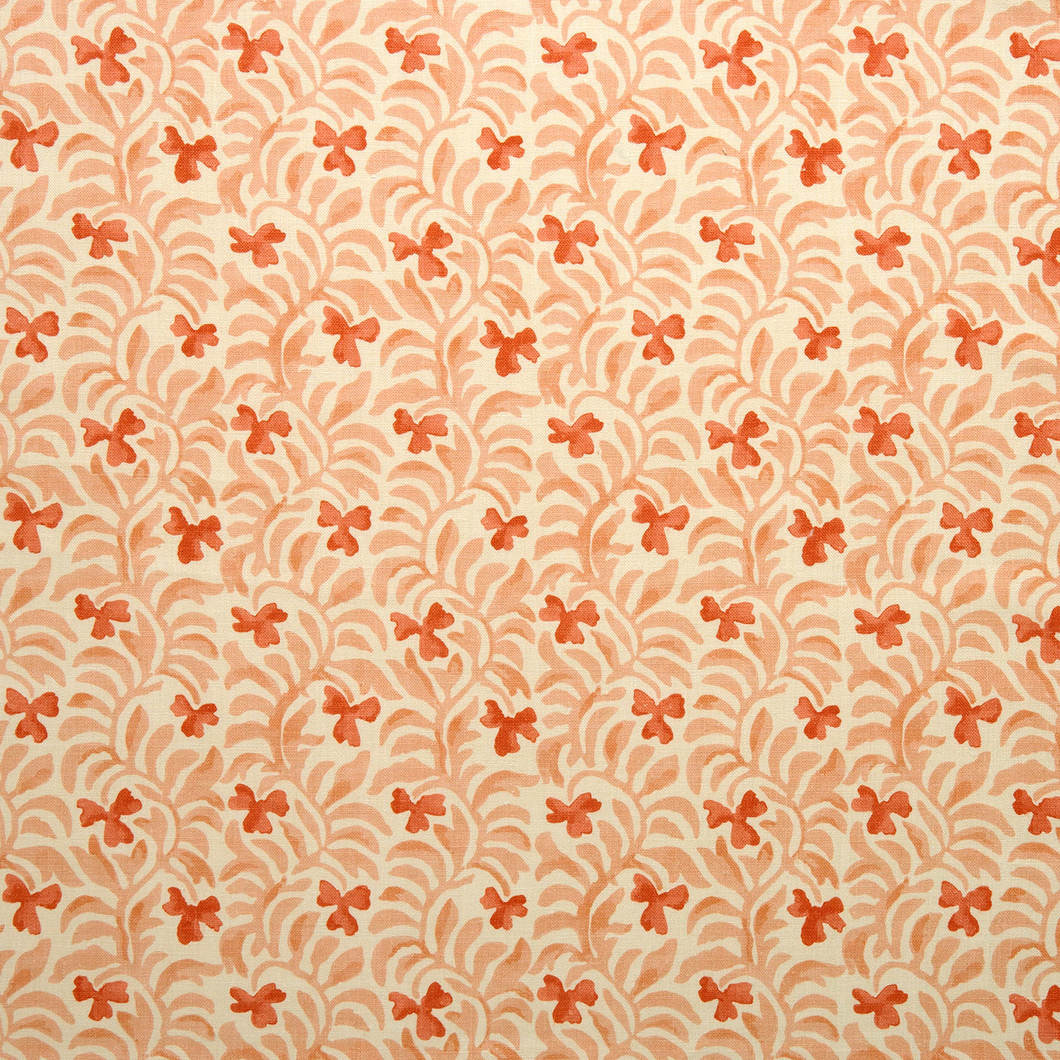 Coral damask cushion fabric with pale scrolling pattern and small floral motifs