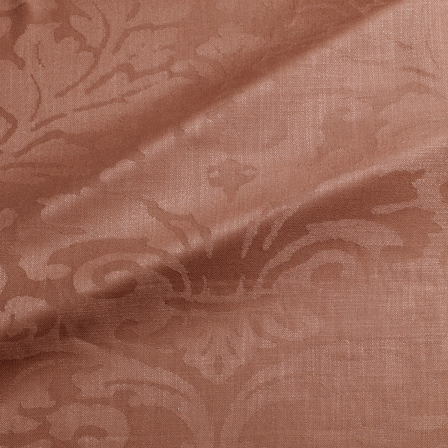 Muted cinnamon terracotta damask fabric with woven scrolling motifs and fine textured grain