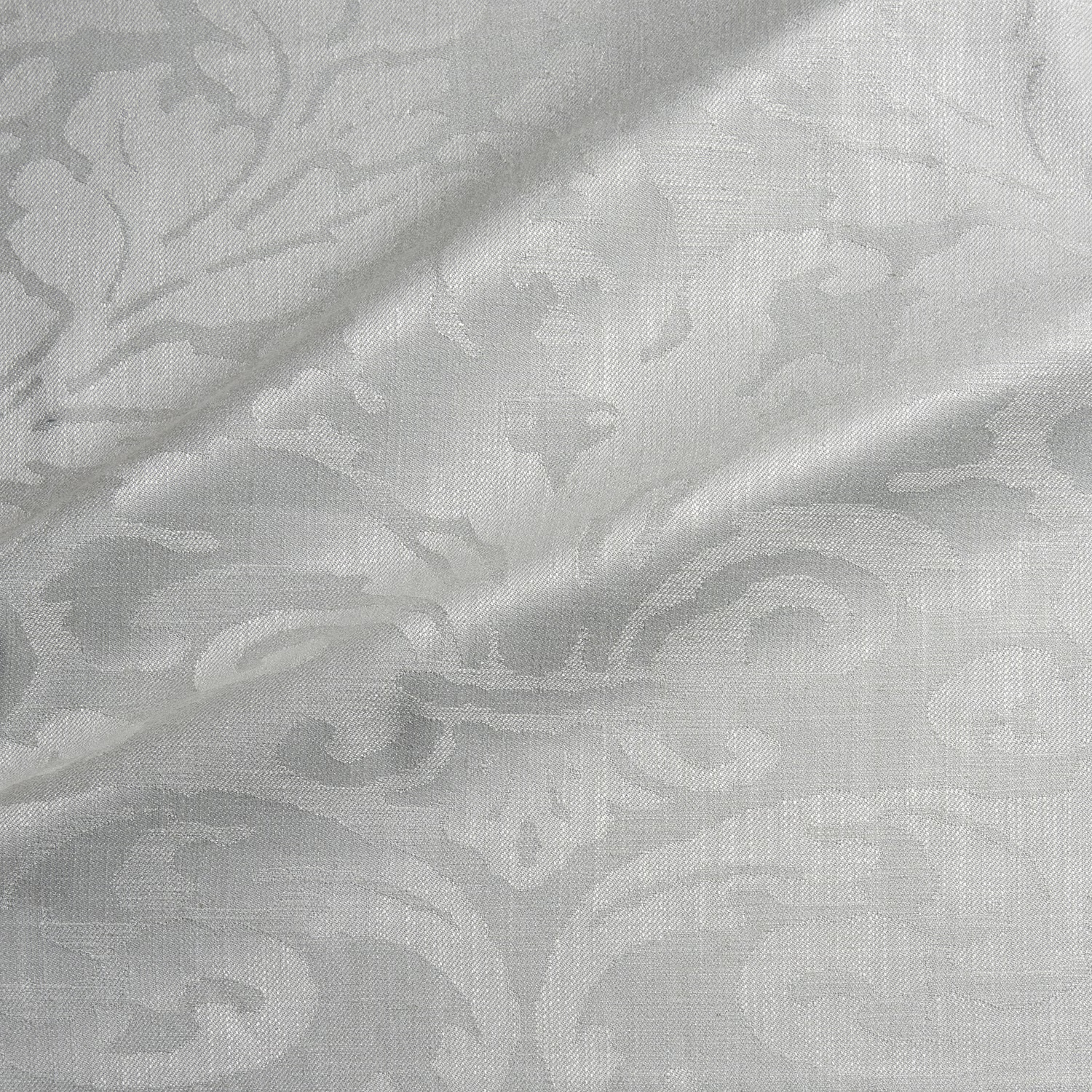 Pale silver-grey woven damask with soft ivory scrolling floral motifs