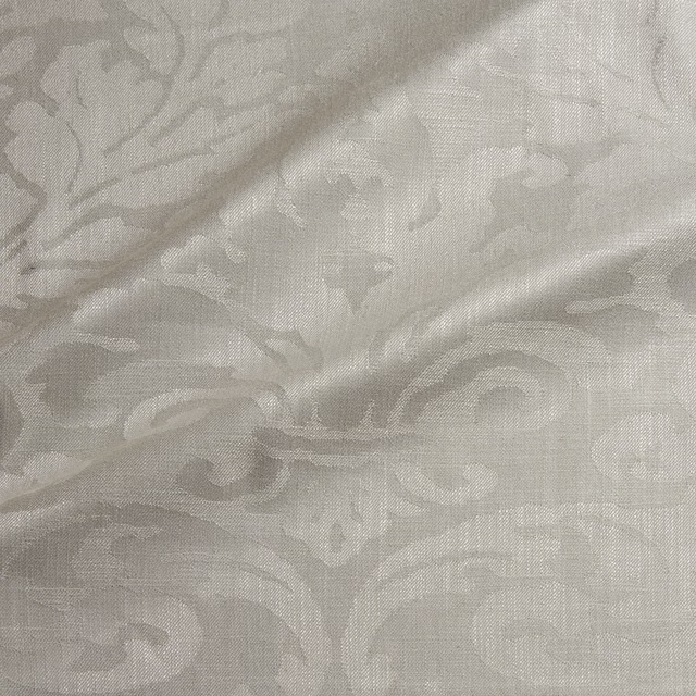 Pale mushroom taupe woven damask with scrolling leaves and subtle tonal texture