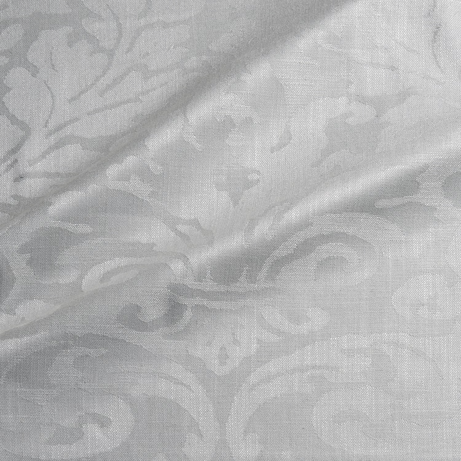 Pale silver-grey woven damask with soft scrolling motifs and fine crosshatch texture