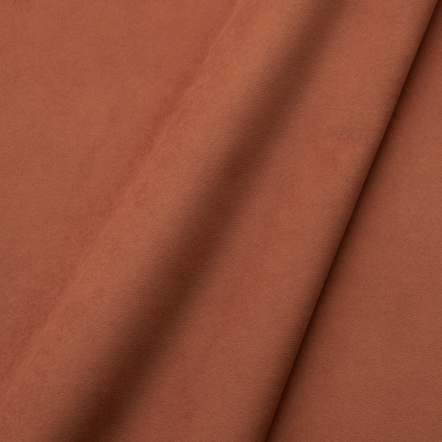 Warm brick terracotta velvet with smooth pile and darker folded nap
