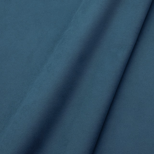 Deep denim-blue plain velvet with directional nap and subtle folded-surface sheen