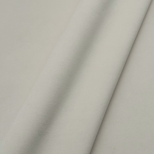 Cool feather-grey plain velvet with a soft, directional nap catching the light