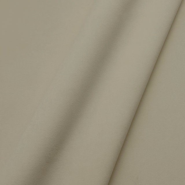 Pale lichen-green velvet with a soft nap and shaded diagonal fold