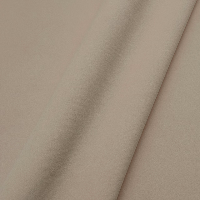 Warm mushroom-taupe velvet swatch with soft directional pile and shaded folded surface