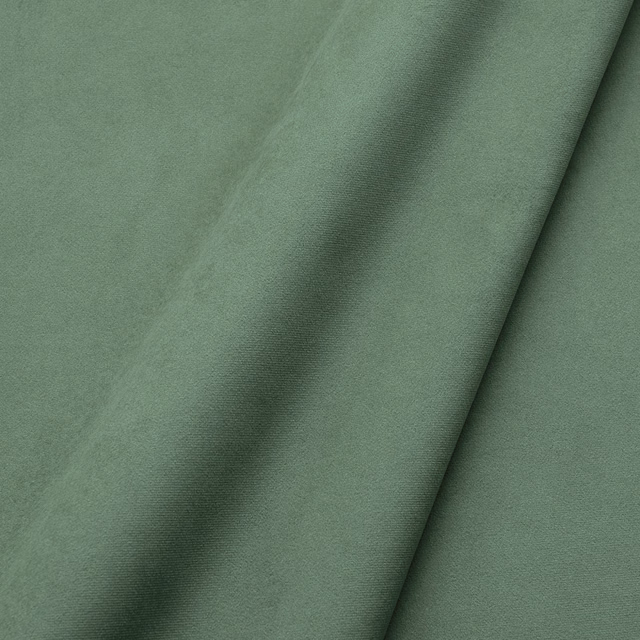 Muted moss-green velvet showing a soft directional pile and gentle tonal sheen