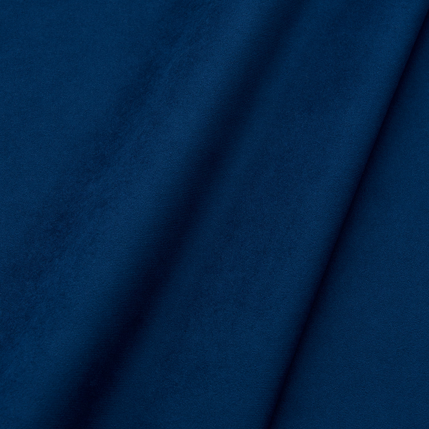 Deep navy blue velvet swatch showing a plain pile with dark folds and blue highlights
