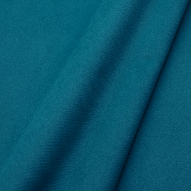 Deep ocean teal velvet with a plush nap and soft folded highlights