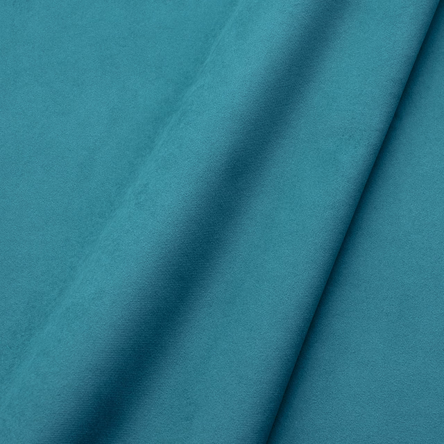 Saturated turquoise teal velvet swatch with a dark folded nap and soft sheen
