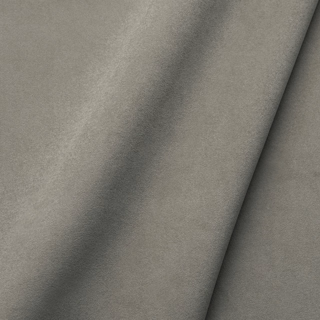 Cool sea-salt grey velvet with a soft nap and deep fold shading