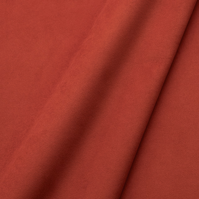 Saturated tomato-red plain velvet with softly shifting low-pile texture