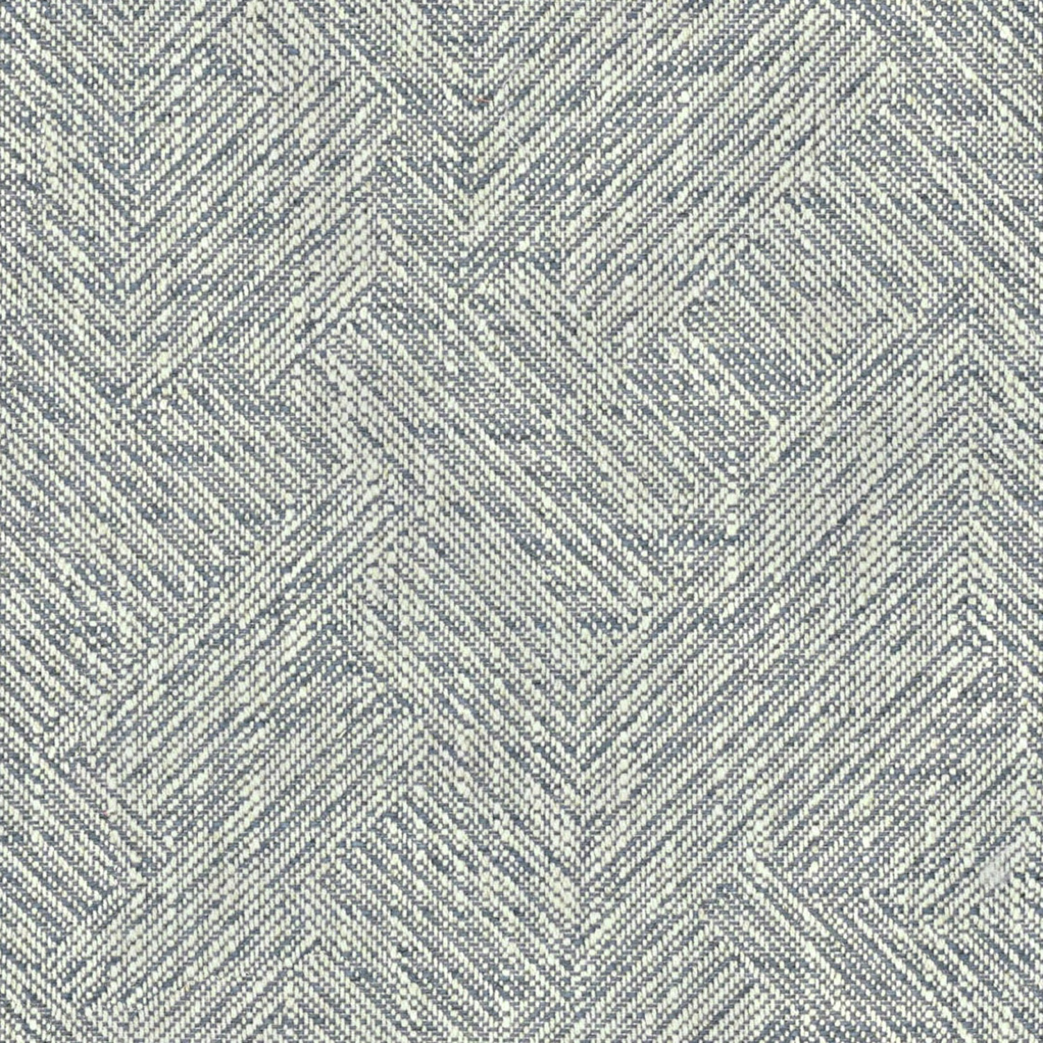 Muted denim-blue woven chevrons with pale grey flecks in close-up