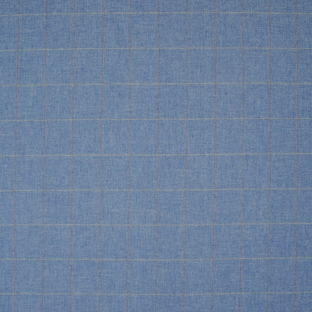 Muted denim-blue woven fabric with fine taupe grid lines and soft texture