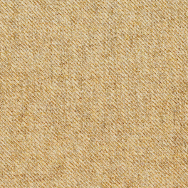 Warm golden beige fabric with a fine diagonal herringbone weave and softly flecked texture