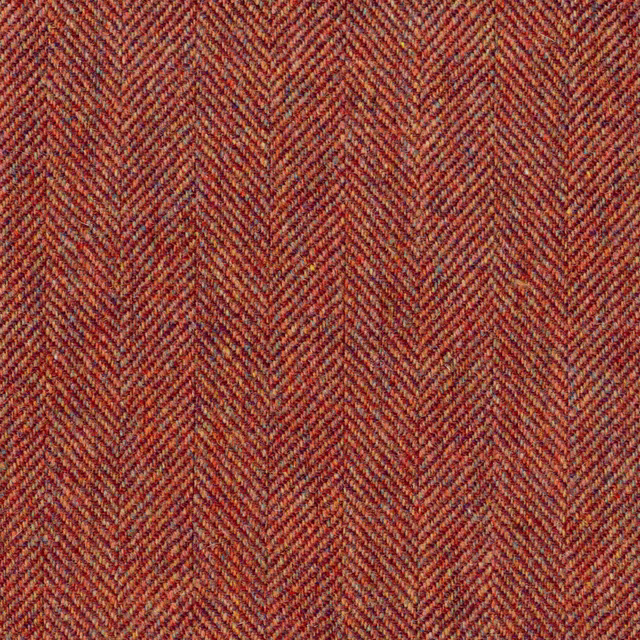 Rust-red, terracotta and brown close-up fabric with fine textured herringbone weave
