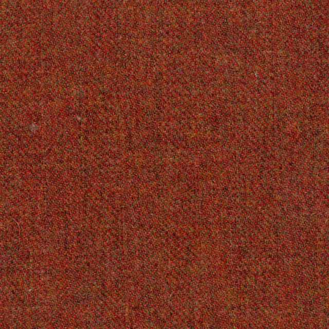 Deep russet red herringbone weave with olive-brown flecks and fine texture