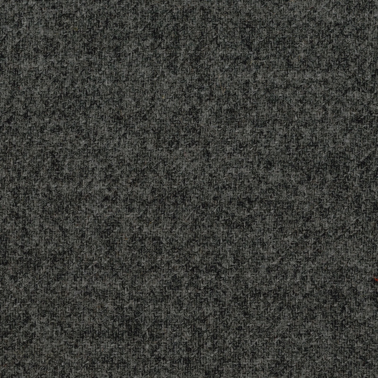 Dark charcoal-grey woven textile with fine mottled flecks and shadowed texture