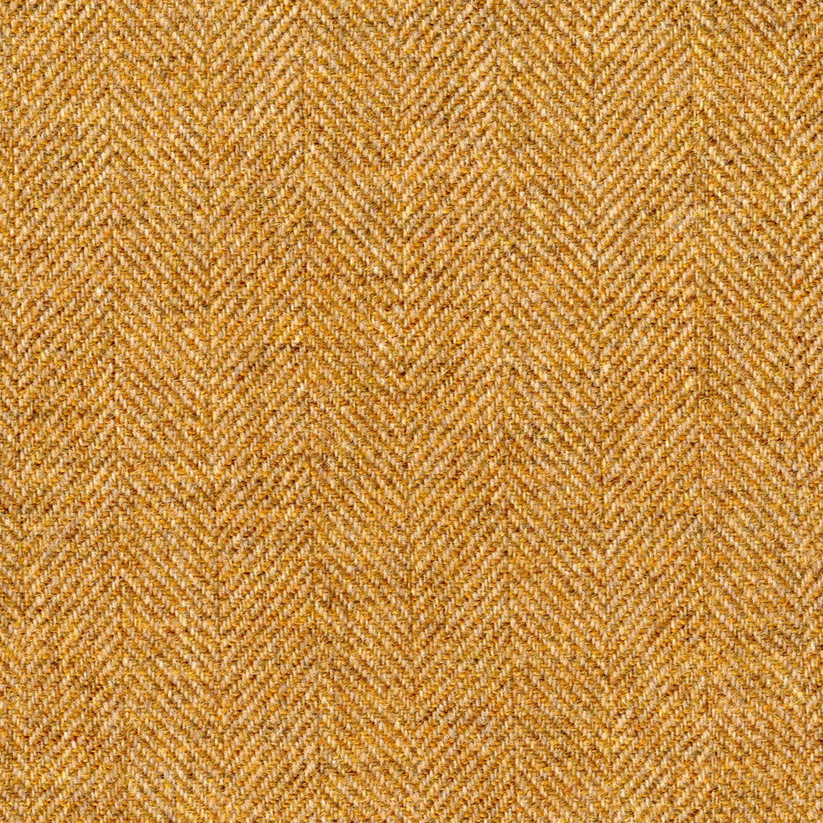 Warm ochre-gold fabric with a fine woven herringbone texture and amber flecks