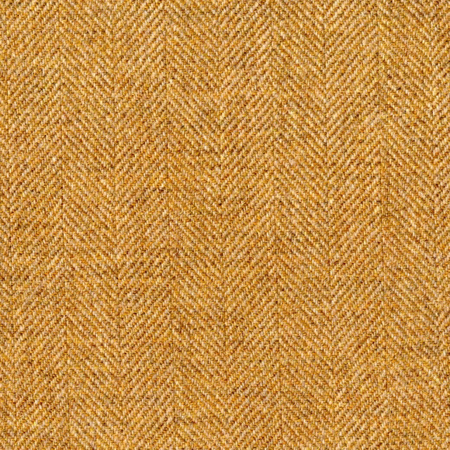 Warm ochre-gold fabric with a fine woven herringbone texture and amber flecks
