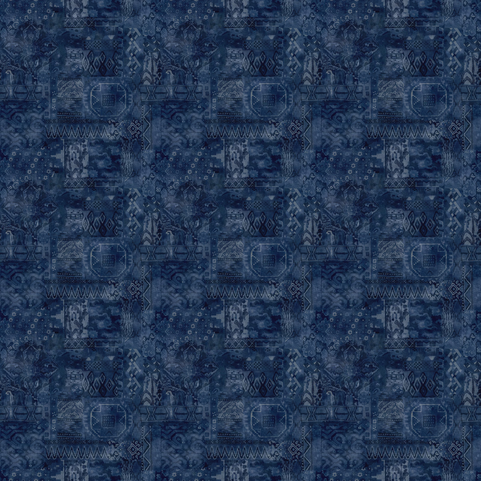 Deep indigo fabric with distressed geometric kilim-style motifs and blue-grey highlights