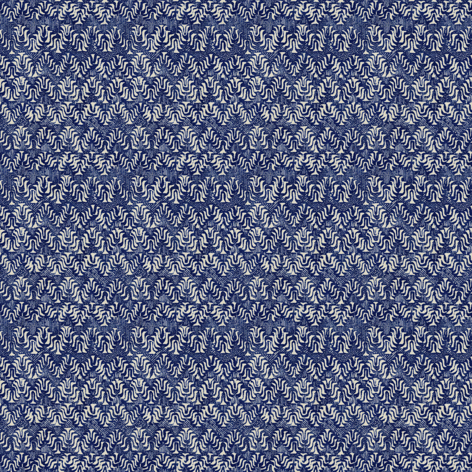 Dense pale ric rac motifs across a deep ultramarine blue textile