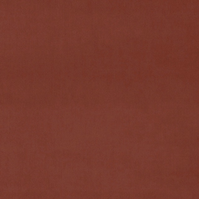 Deep brick-red velvet swatch with a soft, even pile