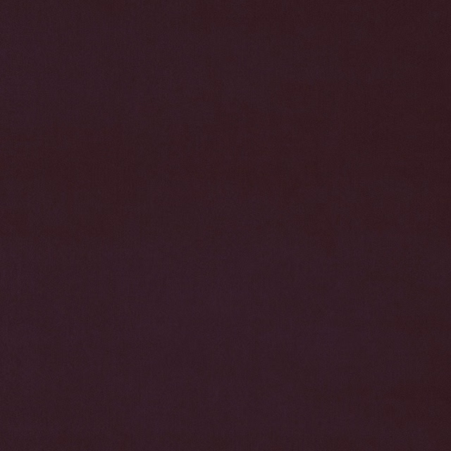 Deep plum purple velvet swatch with a smooth plain pile
