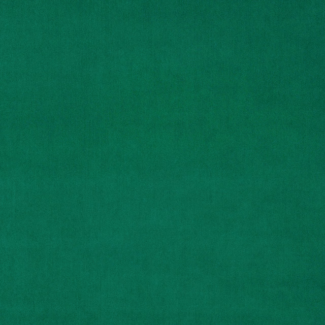 Bright mantis green plain velvet swatch with a smooth, dense pile