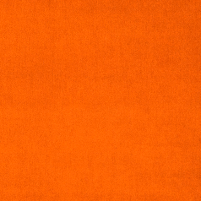 Bright burnt orange plain velvet swatch with a soft, even pile