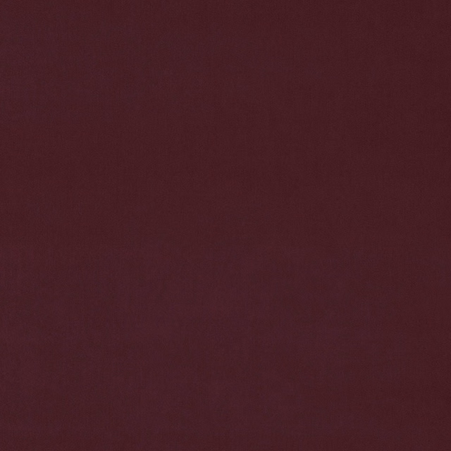Deep burgundy plain velvet fabric with a soft, shadowed pile
