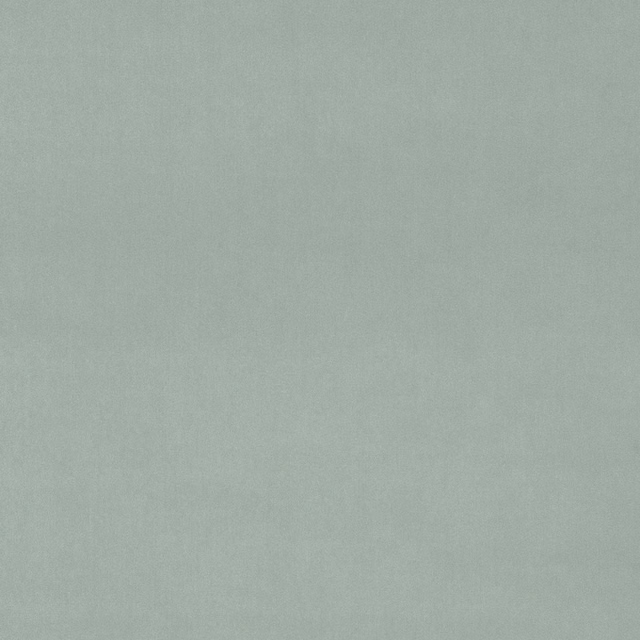 Soft muted sage plain velvet fabric with a smooth, matte pile