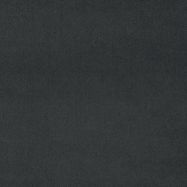 Close-up of plain deep slate grey velvet with a soft low-sheen finish