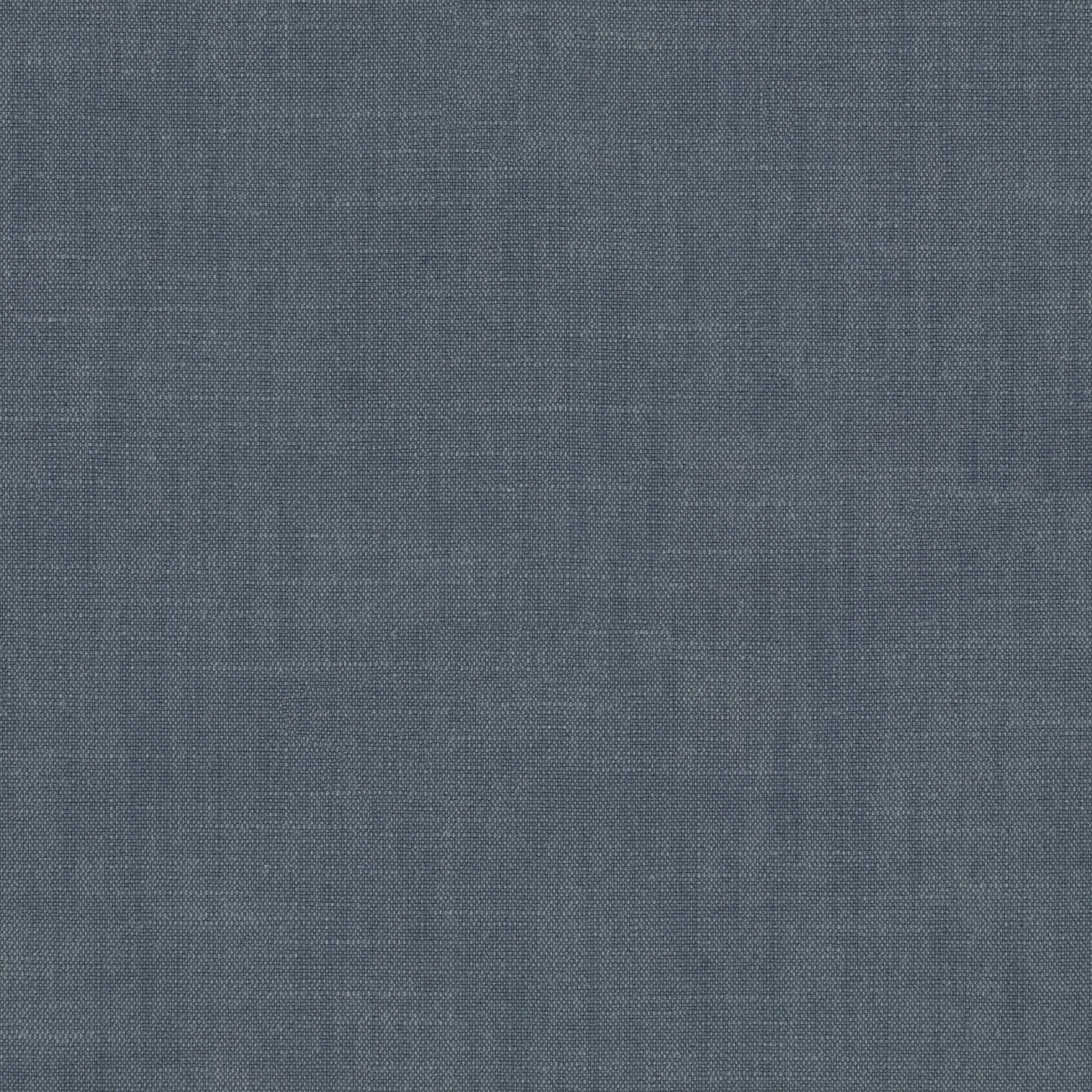 Close-up of a plain woven fabric in muted dusty cobalt blue