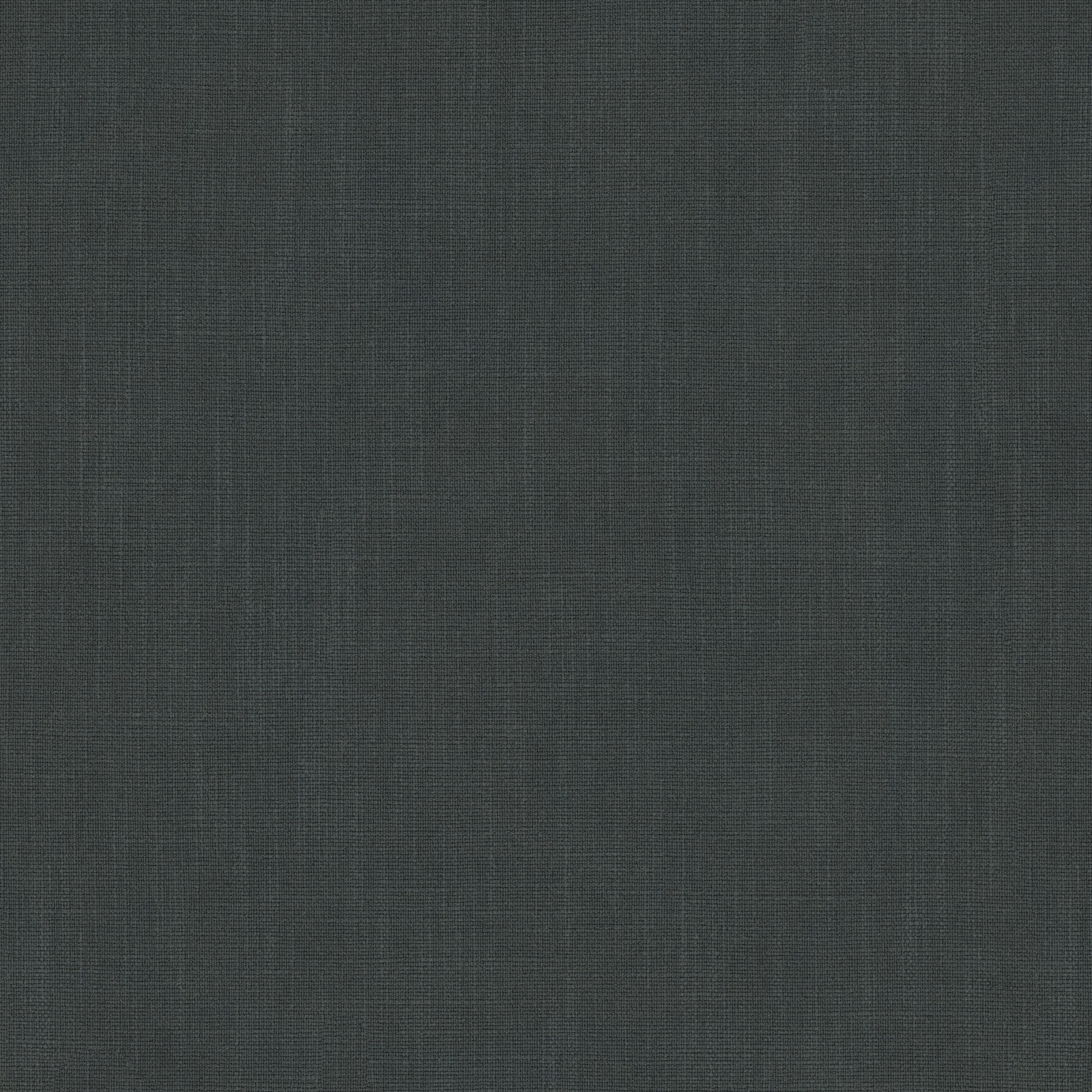 Close-up of plain deep forest green woven fabric with a fine matte texture